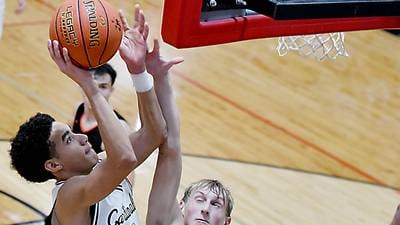 Slaughter’s career night powers Newton boys to win over Grinnell in season opener