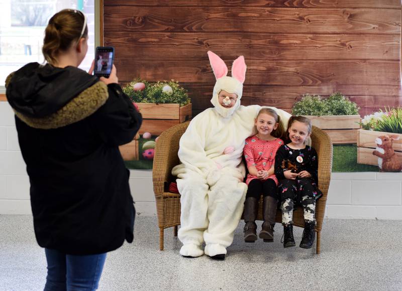 The Easter Bunny poses for pictures during the Spring Celebration on April 2 at the Prairie City Community Building.