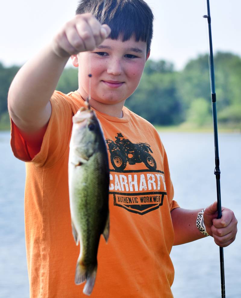 Young anglers catch bluegills and bass (and sometimes softshell turtles) during the Youth Fishing Derby on June 3 at Quarry Springs in Colfax.