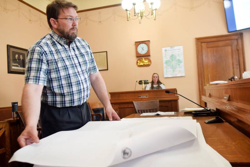 Jasper County Engineer Michael Frietsch shows the updated designs of the new secondary roads yard at Liberty Avenue in Newton during the May 9 board of supervisors meeting.