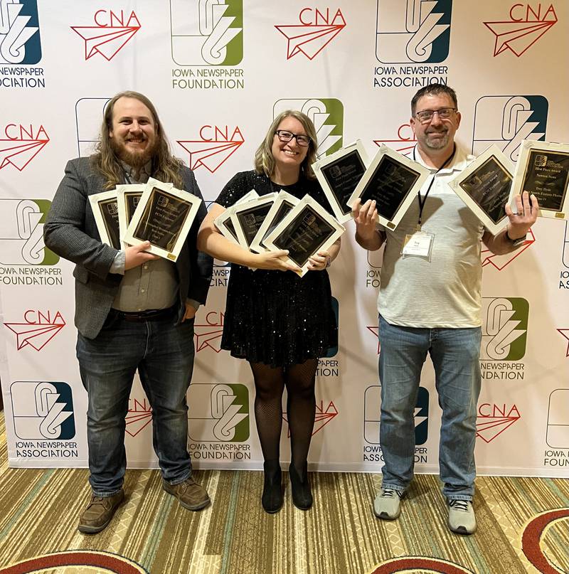 From left: associate editor Christopher Braunschweig, editor Jamee A. Pierson and sports editor Troy Hyde of the Newton News, PCM Explorer and Jasper County Tribune display their first place awards received during the 2024 Iowa Newspaper Association Awards on Feb. 8 at the Marriott hotel in downtown Des Moines.