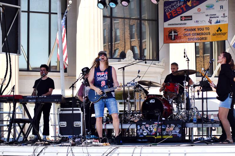 Sean Feucht performs during the inaugural Fierce Faith Music Worship Fest on June 19 in downtown Newton.