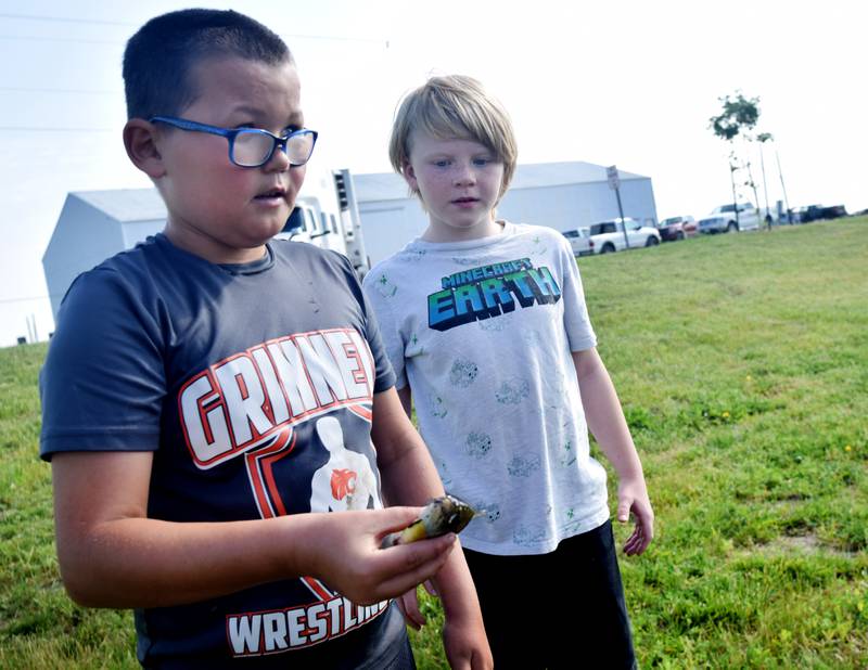 Young anglers catch bluegills and bass (and sometimes softshell turtles) during the Youth Fishing Derby on June 3 at Quarry Springs in Colfax.