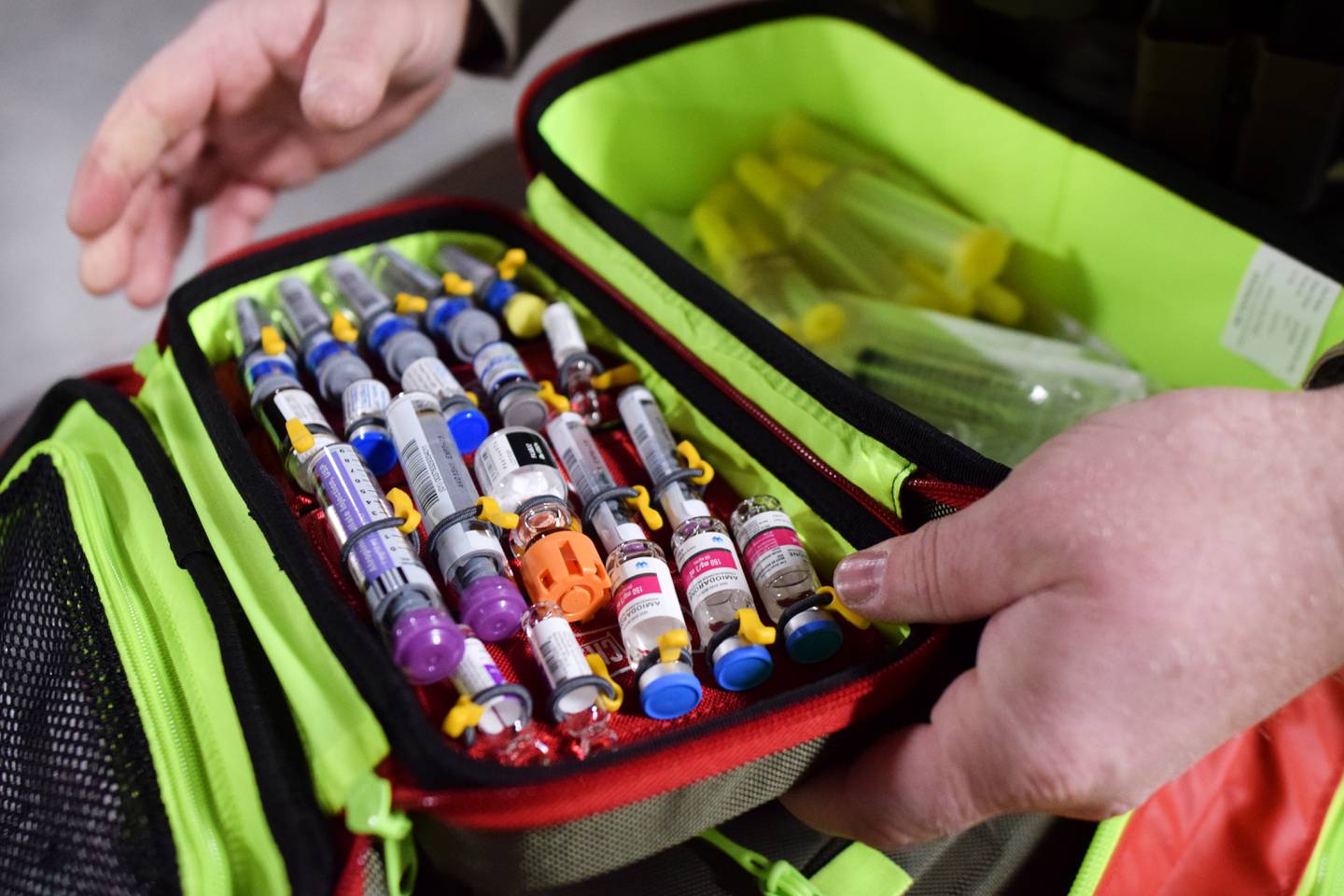 Steve Ashing, a reserve deputy paramedic for the Jasper County Sheriff's Office, opens a pack full of medications. Ashing is part of the advanced life support pilot program at the sheriff's office, which allows part-time reserve deputies with paramedic-level training to respond to emergency calls in rural areas and assist volunteer agencies.