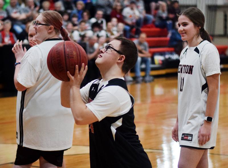 Sam Simon shoots a two-pointer during The Big Game on April 19 at Newton High School.