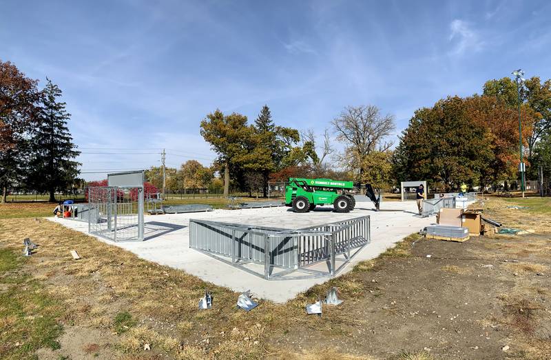 Musco Sports Lighting crews construct the new soccer mini-pitch on Oct. 29 in Maytag Park. The project was led by soccer enthusiasts who managed to fundraise $150,000 for the project.