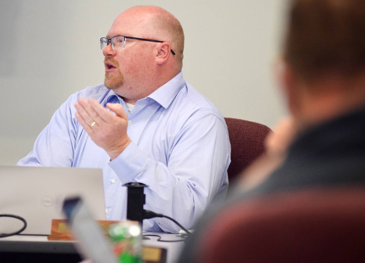 Tim Bloom, director of business services at Newton Community School District, discusses master planning and facility assessments during a work session Aug. 8 at the E.J.H. Beard Administration Center.