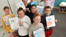 Young author-illustrators at Newton Christian School create their own book for the StoryWalk