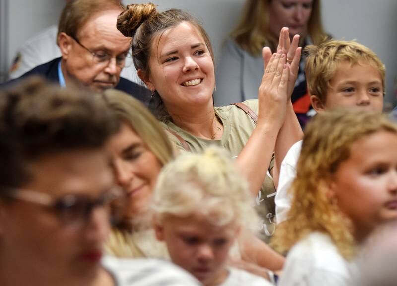 Newton residents react to a decision by the city council on Sept. 6 to support the construction of Harmony Park and contribute $225,000 to the project, on top of the nearly $400,000 already raised by volunteers and stakeholders. Supporters packed the council chambers and spoke in favor of the project, saying the community largely supports it.