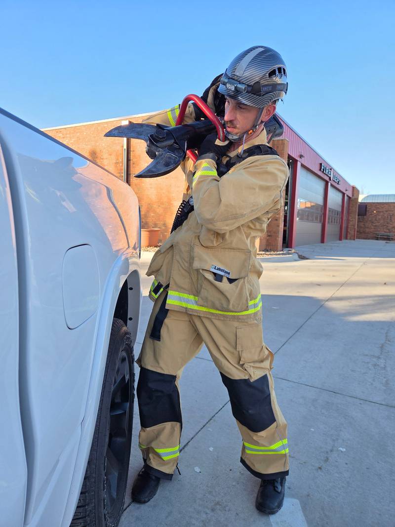 NFD Captain Ryan Volk displays the new dual-certified gear.