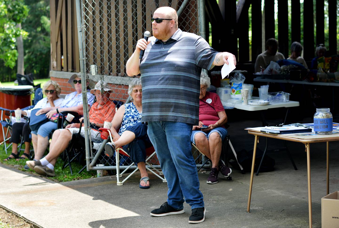 Travis Terrell, a Democratic candidate vying for Iowa's 1st Congressional District seat, speaks for the working class during a potluck picnic hosted by the Jasper County Democratic Party on June 28 at Maytag Park in Newton.