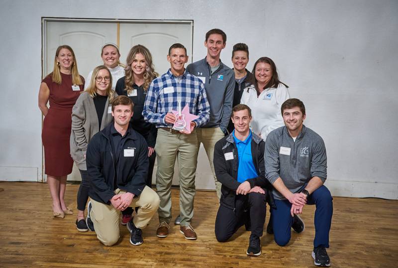 Kinetic Edge Physical Therapy accepts the Community Rock Star Award for a small business during the Greater Newton Area Chamber of Commerce's annual meeting on Jan. 26 at The Thunderdome.
