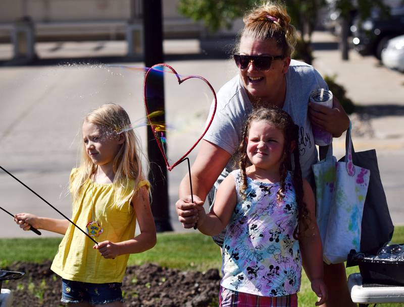 Lots of children participate in the Absolute Science Bubble Open House on June 20 at the Newton Public Library.