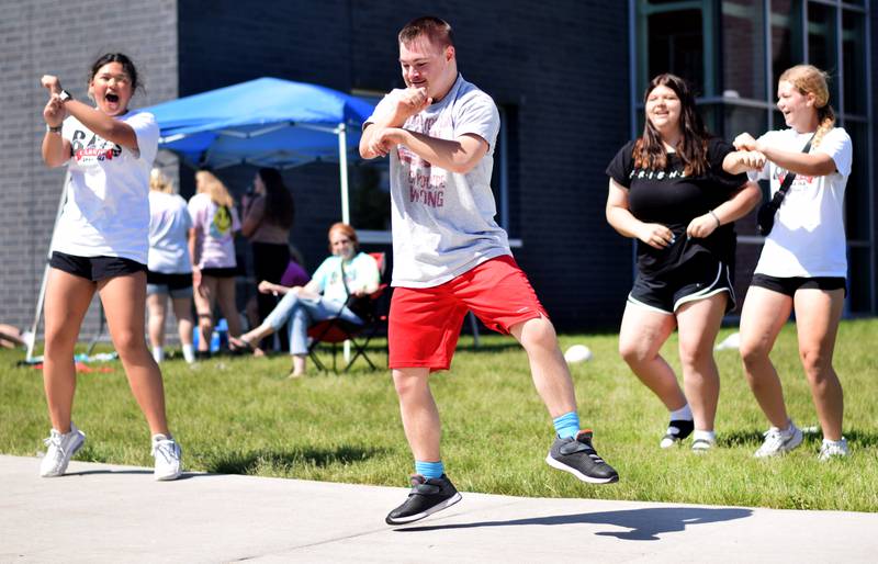 Eighth-grade students at Berg Middle School celebrate their last day as middle schoolers on May 26 by participating in carnival activities.