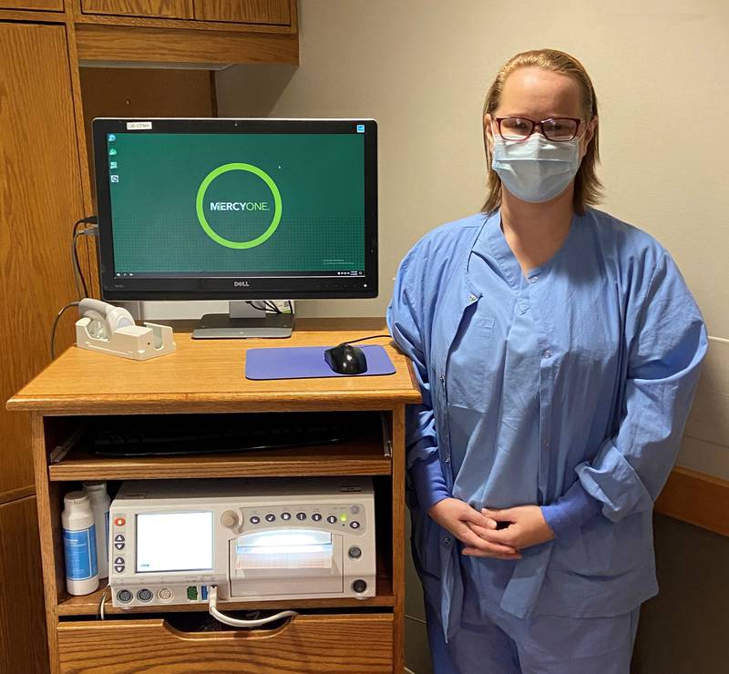 Local obstetrics provider Dr. Hannah Heckart shown with the new GE Coro 259cx series maternal/fetal monitor system at MercyOne Newton, made possible through grant funds from the Jasper Community Foundation.