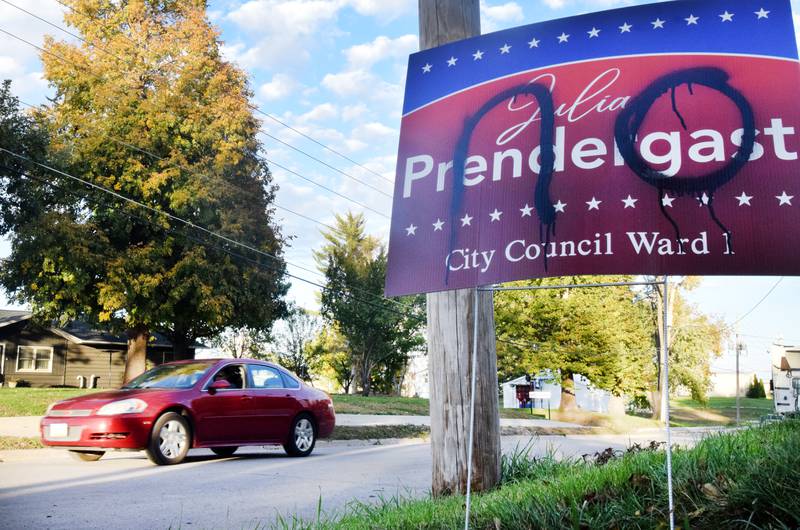 A car passes by a Julia Prendergast for City Council Ward 1 sign that has been defaced with the word "no" on Friday, Oct. 20 along North 11th Avenue East in Newton. Prendergast and fellow candidates Lonnie Appleby, Barney Bushore and Bob Williams decided to hold their own candidate forum, which takes place the same time as the League of Women Voters forum, thereby not allowing any debate or discussions with their opponents.