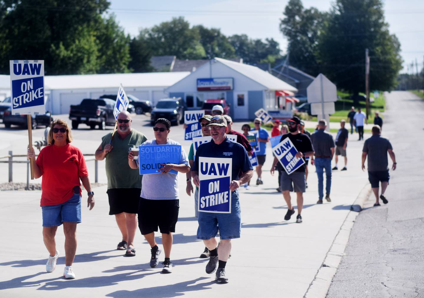 Thombert, Inc. employees and members of the United Auto Workers Local 997 union were supported by fellow union members from across the state on Aug. 25 outside the picket line of the manufacturing company's Newton property.