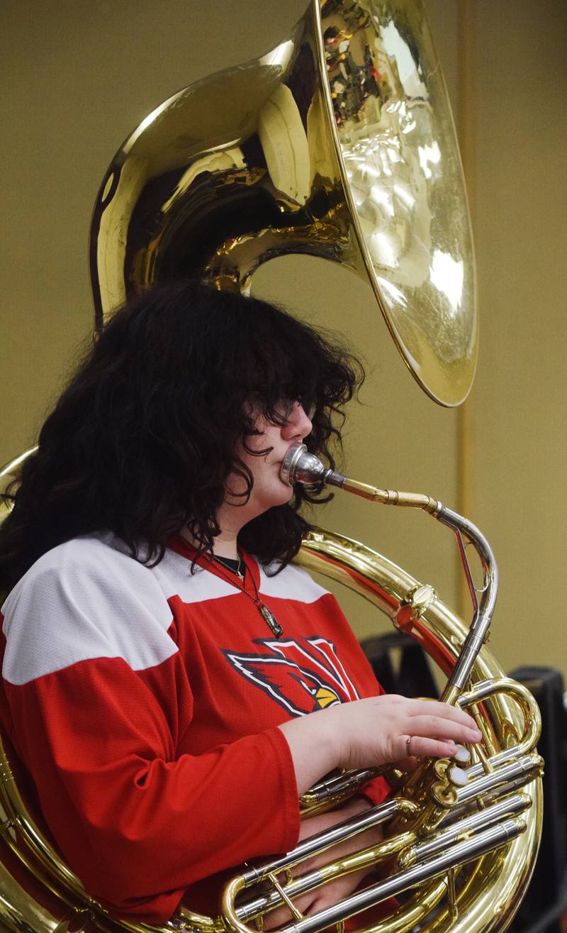 Newton alumni and students have a jam session on Dec. 16 in the band room of Newton High School. Current and past members of the Newton High School band on Dec. 16 participated in the inaugural Alumni Pep Band Night. Adam Kallal, the band director at Newton High School, organized the event in hopes it would become an annual celebration.