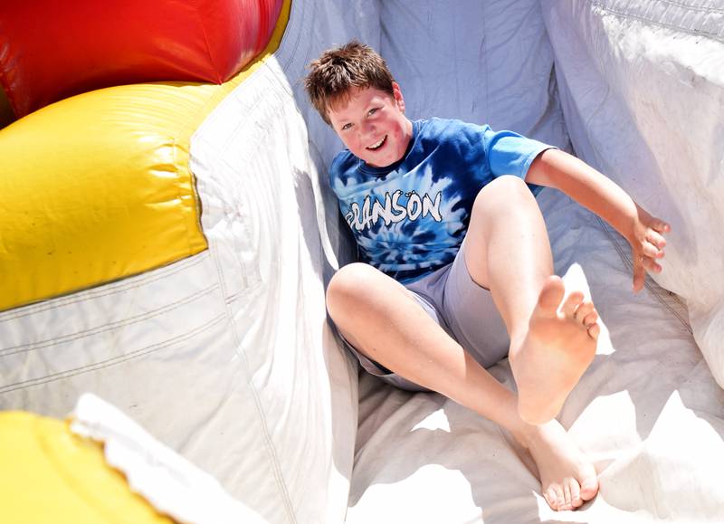 Eighth-grade students at Berg Middle School celebrate their last day as middle schoolers on May 26 by participating in carnival activities.