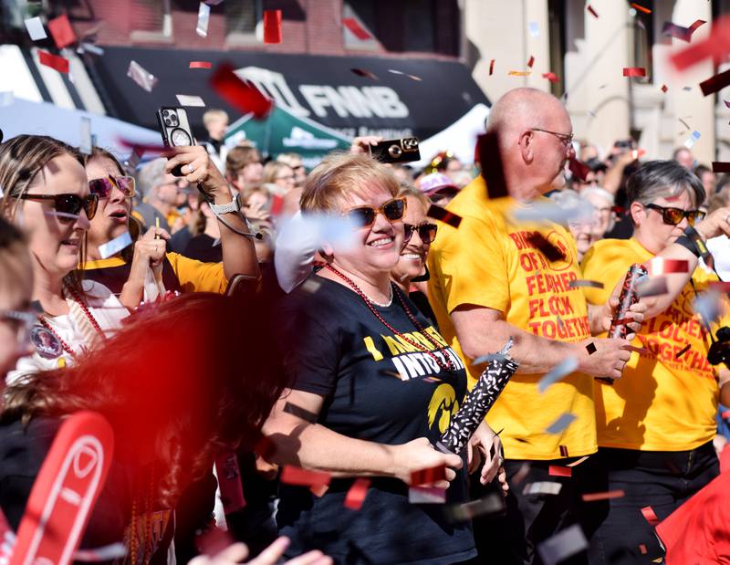 Crowds gathered for the RVTV broadcasts shoot off confetti cannons on Sept. 4 in downtown Newton. Residents wore their Hawkeye or Cyclone gear in preparation for the Cy-Hawk game the next day and treated the RVTV crews to a Cardinal pep rally.