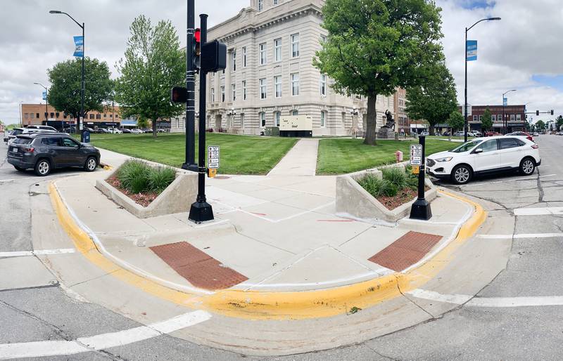 The concrete bunkers on the south side of the courthouse are planned to be removed by Jasper County. Sealed bids were opened at the May 20 board of supervisors meeting, and a contract was awarded to a Colfax-based contractor to remove the bunkers, improve the approaches and replace damaged concrete.
