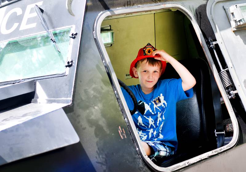 Kids participate in obstacle courses and take a try at the fire hose during Safety Fest on June 8 in Maytag Park. Safety Fest is regularly organized by the Newton Fire Department.