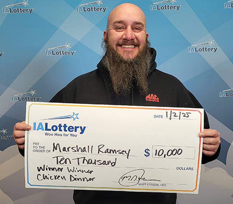 Marshall Ramsey claimed his $10,000 prize at lottery headquarters in Clive.