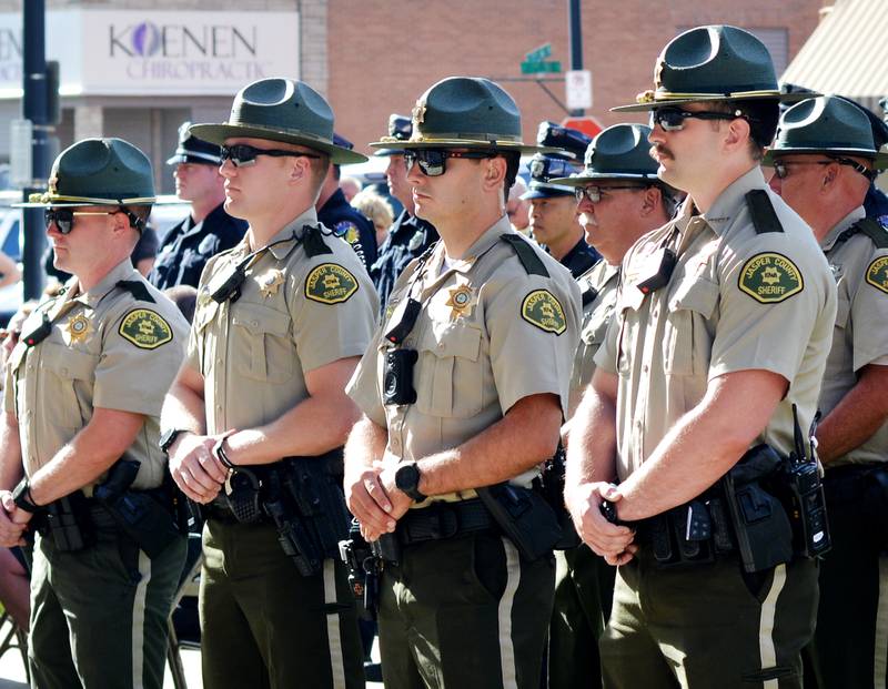 Local law enforcement participate in the National Police Week Ceremony on May 15 at the Jasper County Courthouse in Newton. Community members attended the event to honor the six officers who had made the ultimate sacrifice.