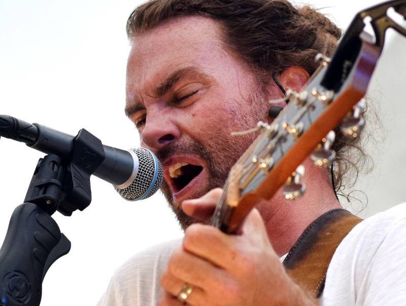 Damon Dotson, a Des Moines-based musician, performs the Maytag Bowl during the last night of Newton Fest on Saturday, June 10 at Maytag Park.