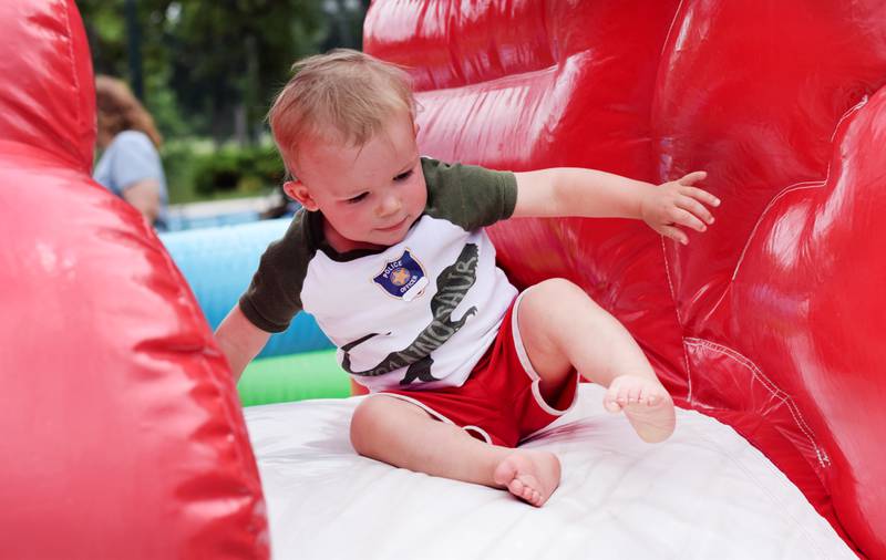 Kids enjoy all the games and activities available in the Fun Zone of Newton Fest on Saturday, June 10 at Maytag Park.