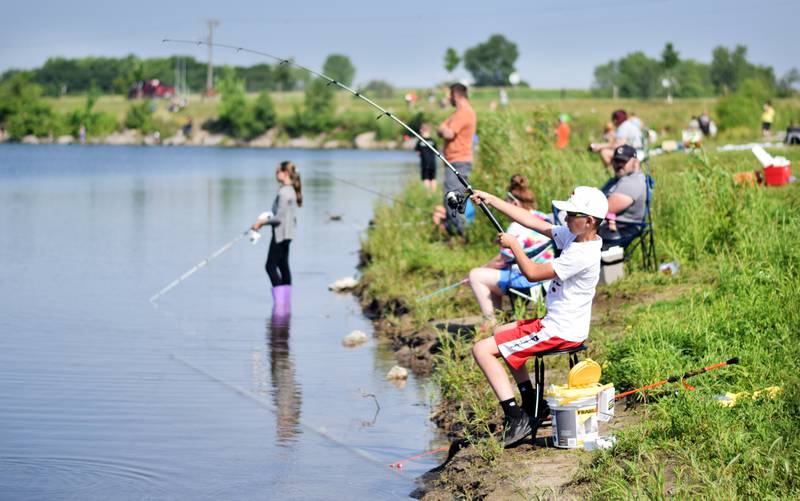 Young anglers catch bluegills and bass (and sometimes softshell turtles) during the Youth Fishing Derby on June 3 at Quarry Springs in Colfax.