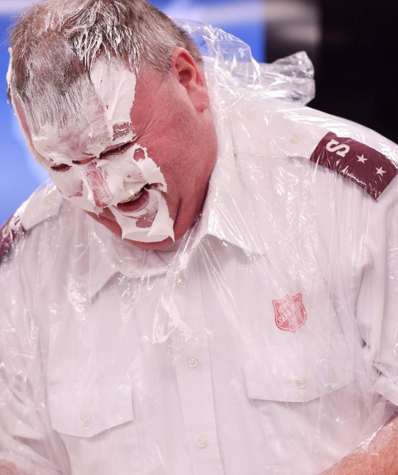 As a result of Rotary raising more funds for the Salvation Army than Kiwanis, Captain  Tim North voluntarily took a pie to the face during a volunteer recognition dinner April 19 at the organization's Newton headquarters.