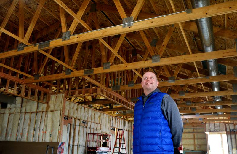 Brad Sponseller, the current golf pro and eventual operations manager of Westwood Golf Course, inspects the progress of the new clubhouse. The city council recently approved a staff reorganization for the clubhouse and purchased new simulators and furniture for the facility.