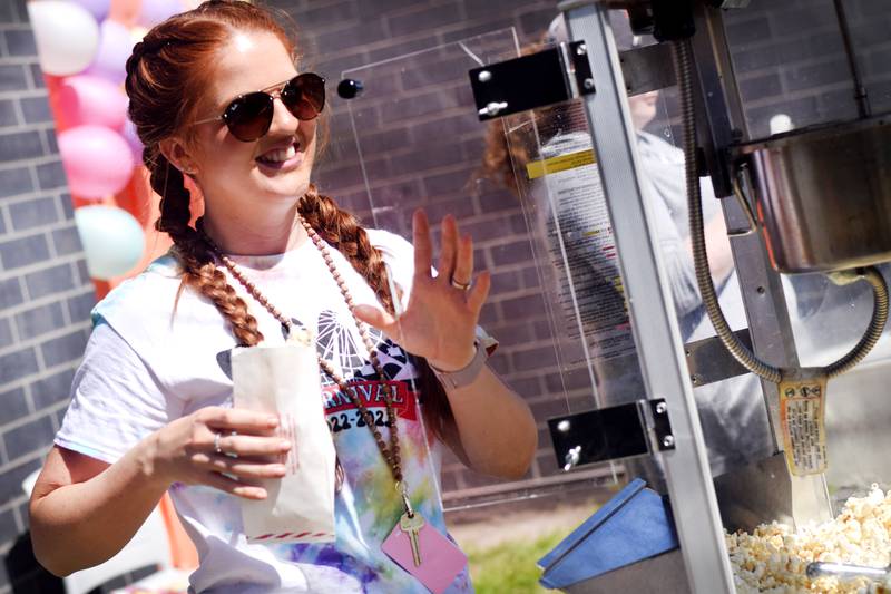 Eighth-grade students at Berg Middle School celebrate their last day as middle schoolers on May 26 by participating in carnival activities.