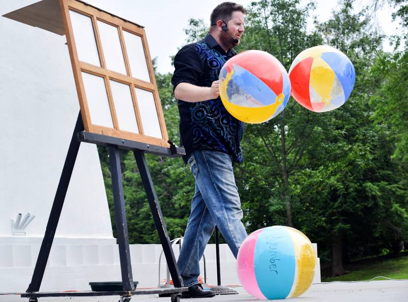 Eric Michaels performs magic and illusions during Newton Fest on Saturday, June 10 at Maytag Park.
