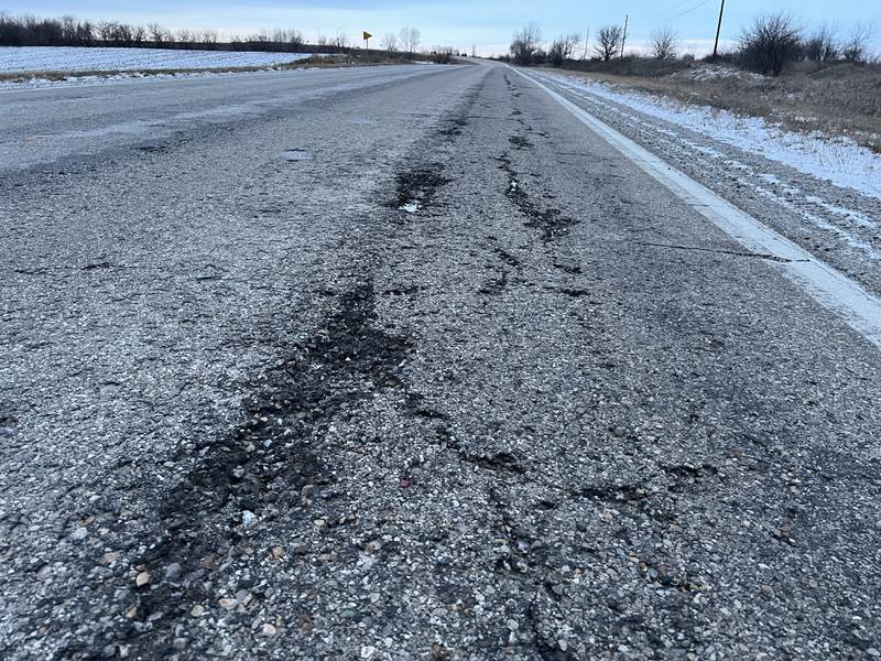 Potholes and patched roadway fill Quicksilver Avenue near Monroe. The road locally known as Old Highway 163 is set to be resurfaced after the Jasper County Supervisors gave approval to the project.