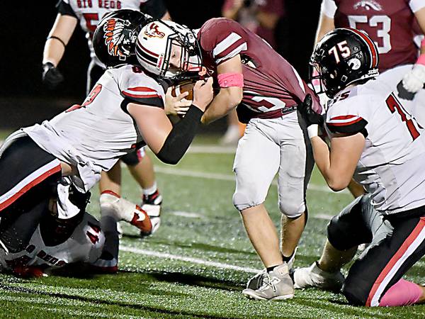 Mustangs run past Big Reds to win third straight district championship