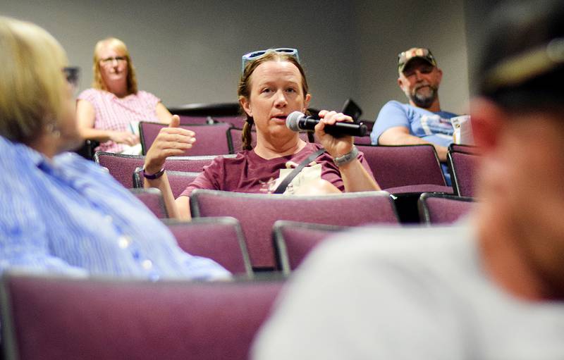 Guests of a town hall ask questions of the Newton RAGBRAI Committee on May 24 at the DMACC auditorium.