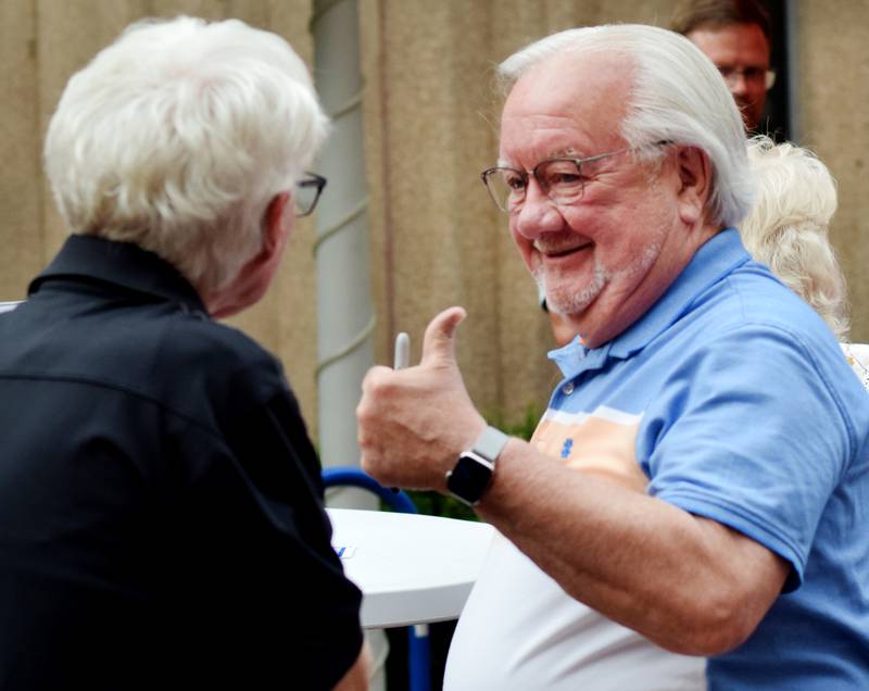 Newton High School graduates gather for drinks and camaraderie at the all-class reunion June 7 at Legacy Plaza. Newton Alumni Weekend brought back Cardinals for a weekend of partying and fellowship.