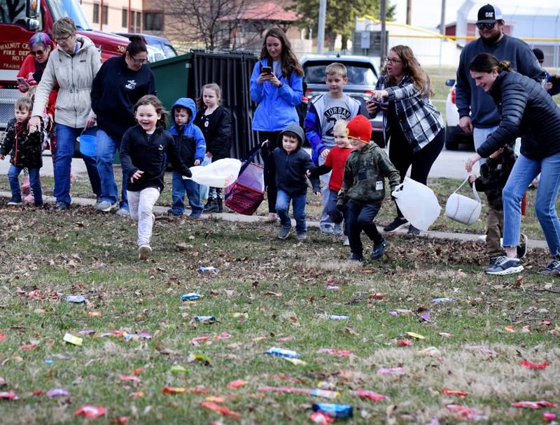 Children participate in the candy throw during the Spring Celebration on April 2 at the Prairie City Community Building.