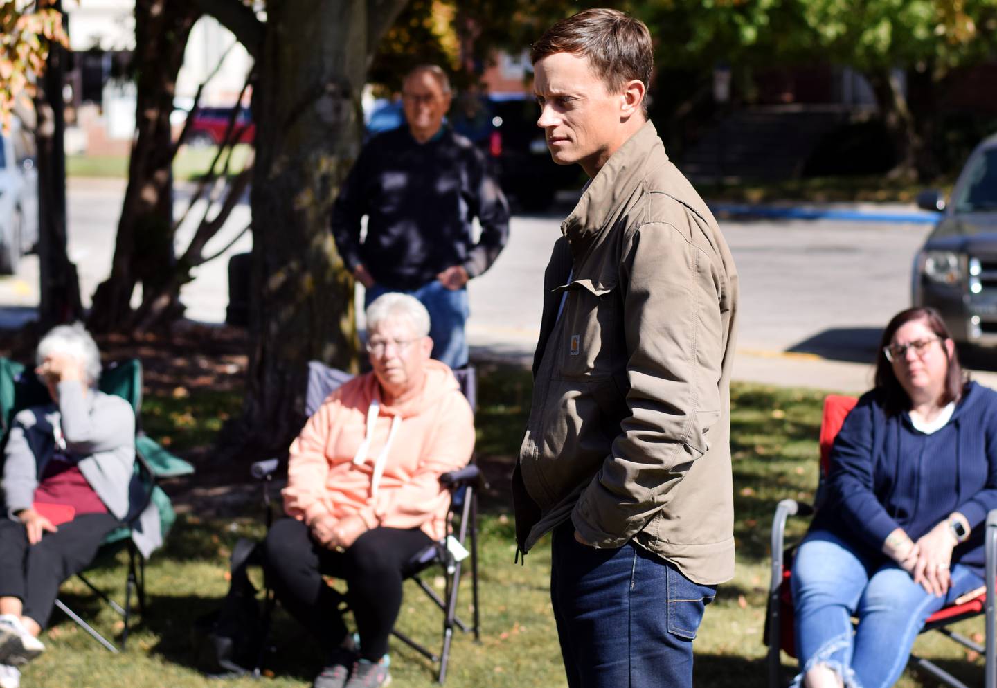 Iowa State Auditor Rob Sand speaks with constituents during a visit Oct. 10 in Newton.