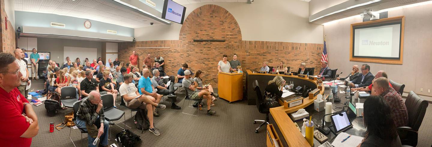 Newton residents speak the city council on Sept. 6 about the construction of Harmony Park. Supporters packed the council chambers and spoke in favor of the park, saying the community largely supports it.