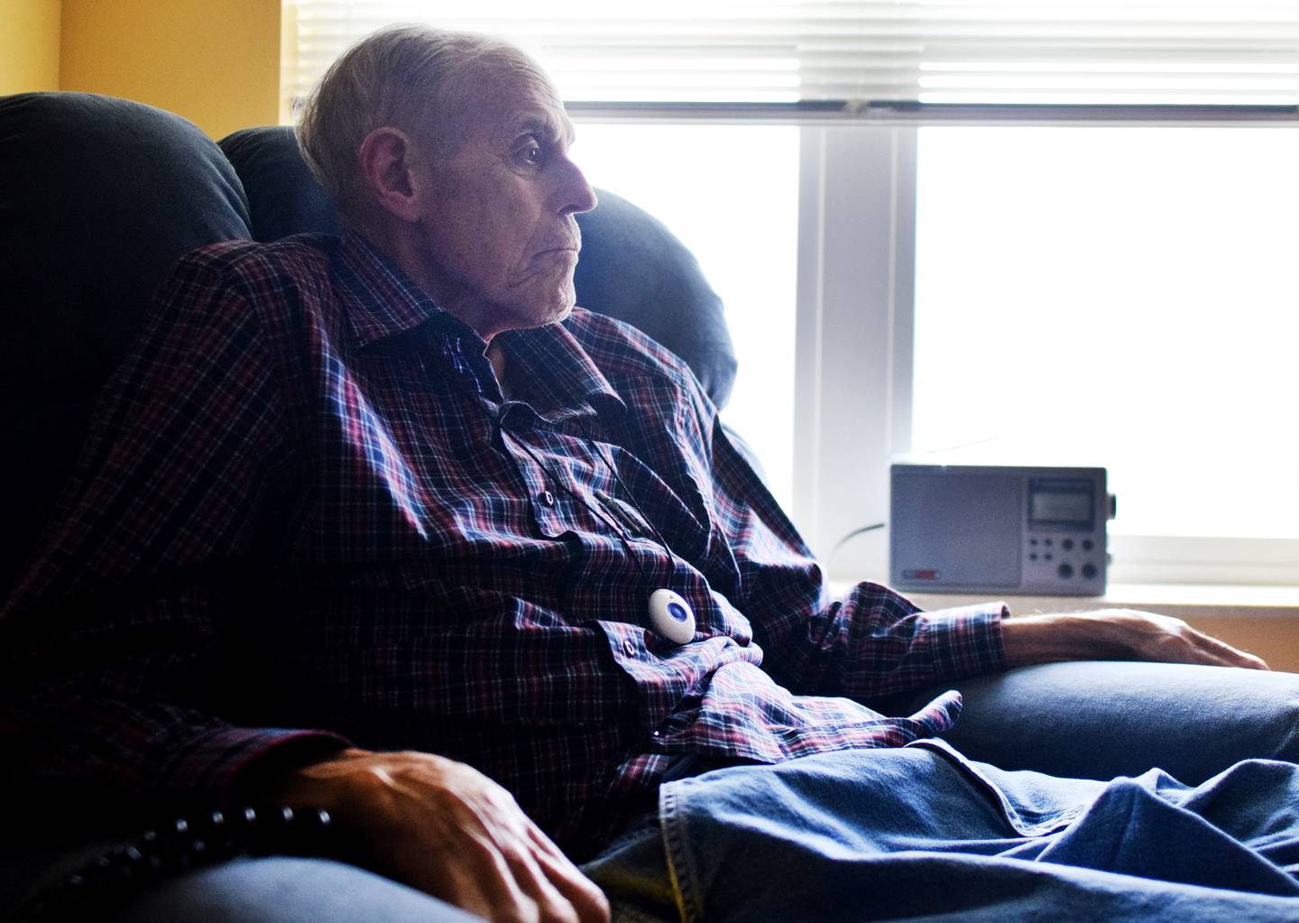 Denny Carpenter, the Republican incumbent running for a seat on the Jasper County Board of Supervisors, stares out the window of his room at Newton Village during the afternoon of Election Day on Nov. 8 in Newton.