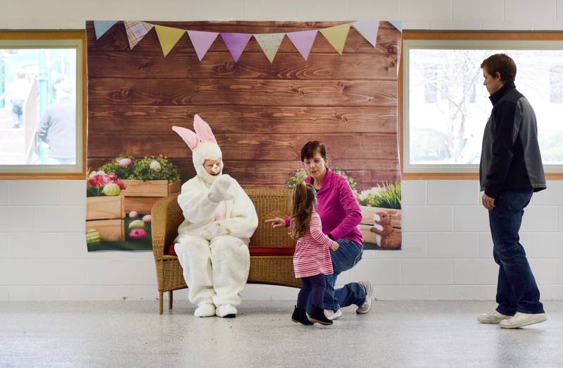 The Easter Bunny poses for pictures during the Spring Celebration on April 2 at the Prairie City Community Building.