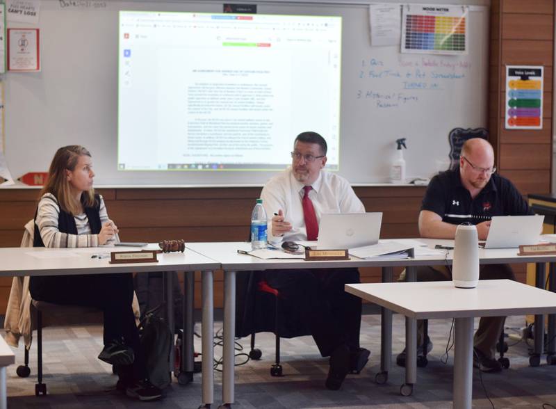 From left: Robyn Friedman, president of the Newton school board; Tom Messinger, superintendent of Newton Community School District; and Tim Bloom, director of business services discuss changes to the school's 28E agreement with the city regarding shared use of certain facilities.