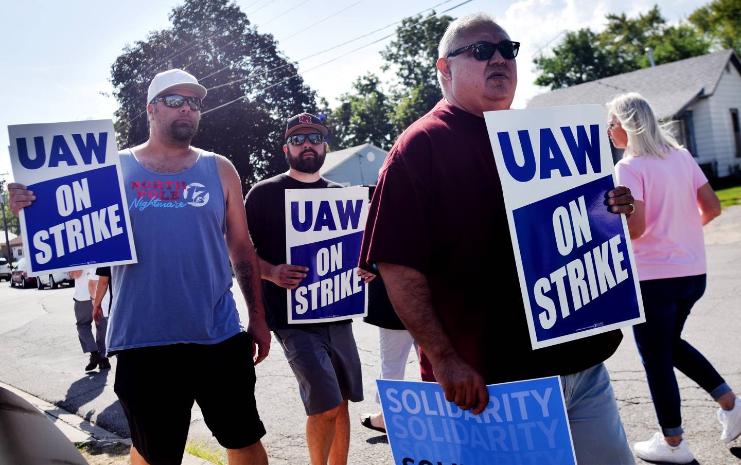 Thombert, Inc. employees and members of the United Auto Workers Local 997 union were supported by fellow union members from across the state on Aug. 25 outside the picket line of the manufacturing company's Newton property.