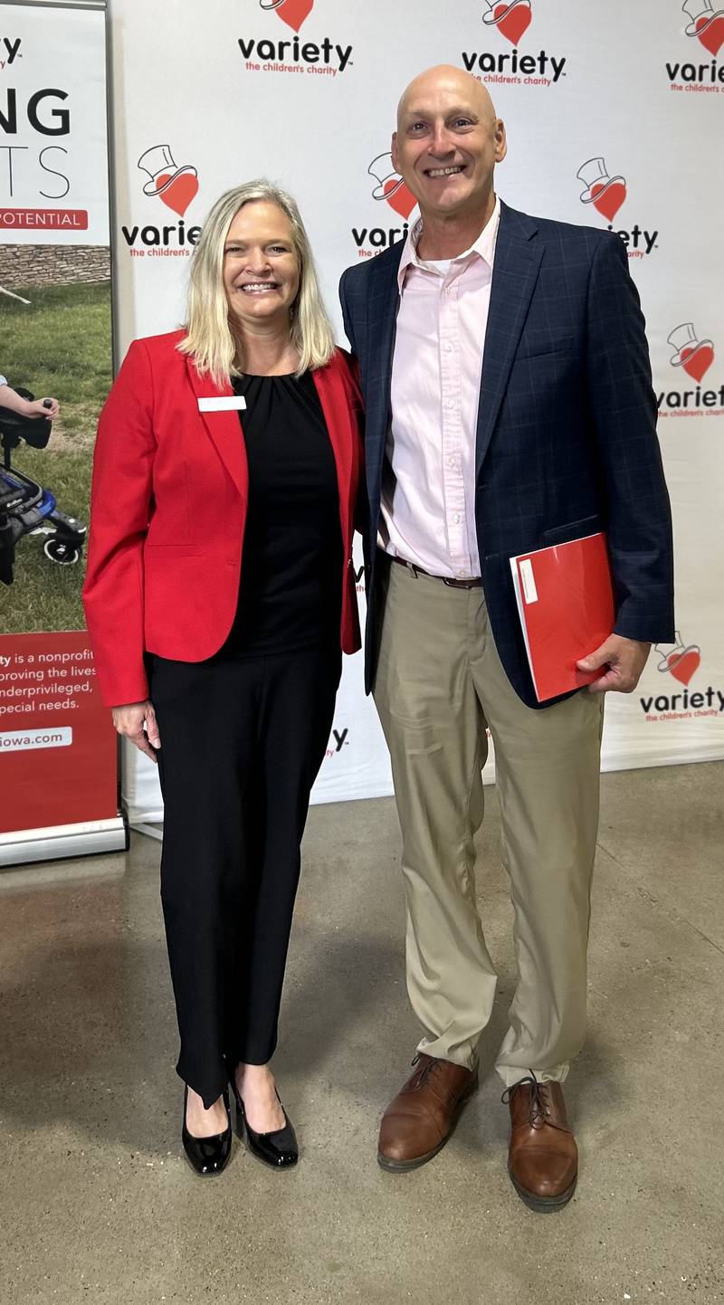 From left: Wendy Ingham, executive director or Variety - the Children's Charity of Iowa, and George Sorenson, chief executive officer of the Newton YMCA, pose for a picture. The children's charity awarded the YMCA with a $40,000 grant.