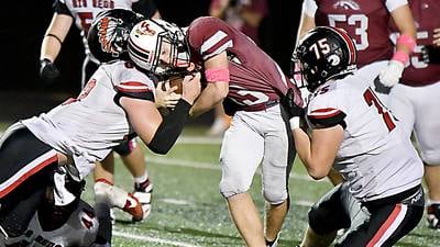 Mustangs run past Big Reds to win third straight district championship