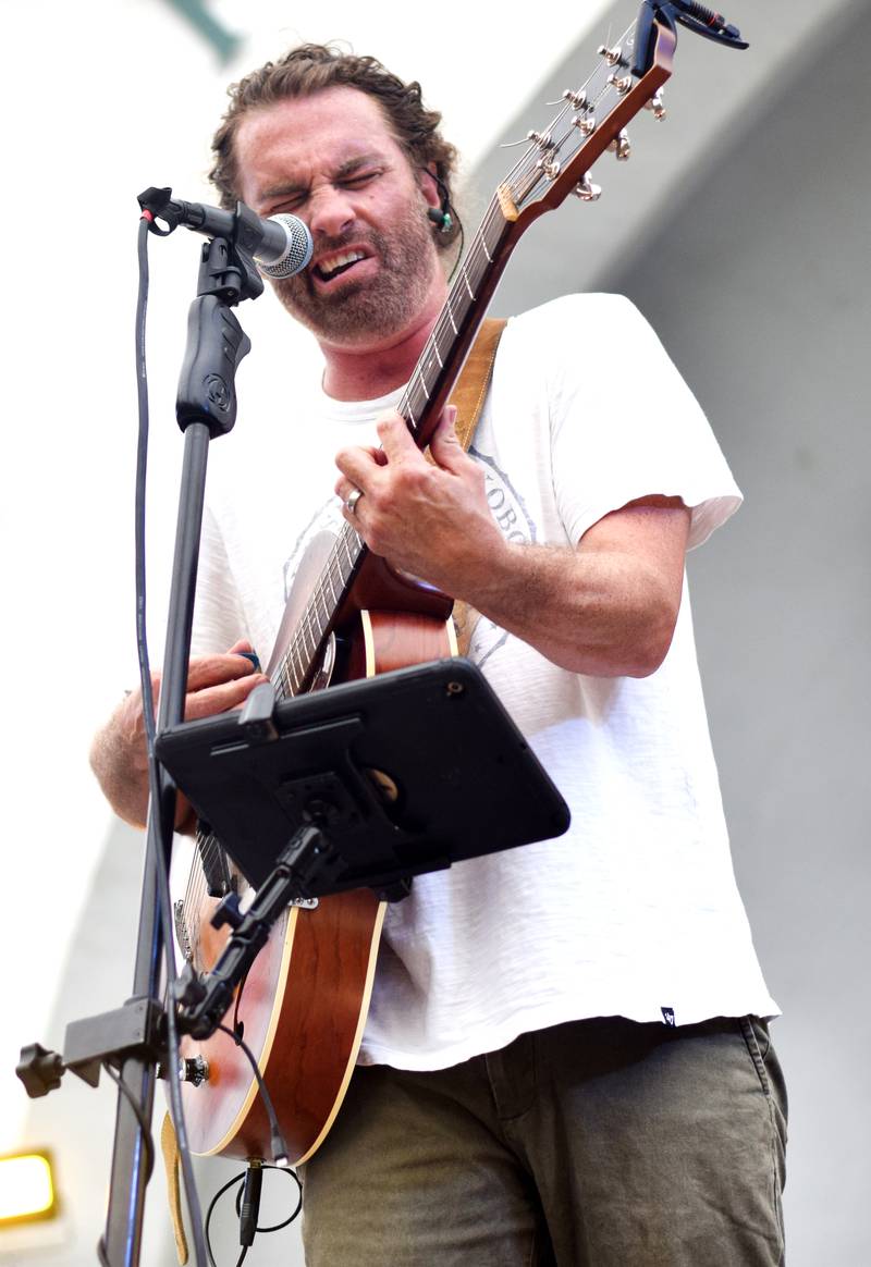 Damon Dotson, a Des Moines-based musician, performs the Maytag Bowl during the last night of Newton Fest on Saturday, June 10 at Maytag Park.