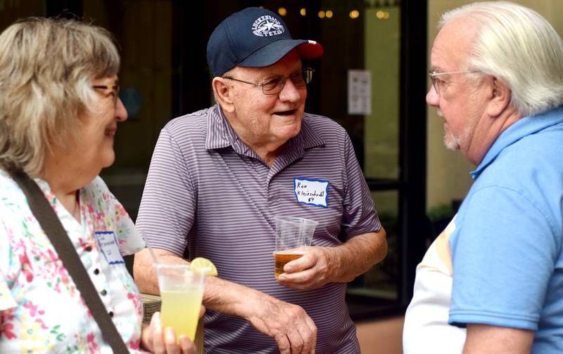 Newton High School graduates gather for drinks and camaraderie at the all-class reunion June 7 at Legacy Plaza. Newton Alumni Weekend brought back Cardinals for a weekend of partying and fellowship.